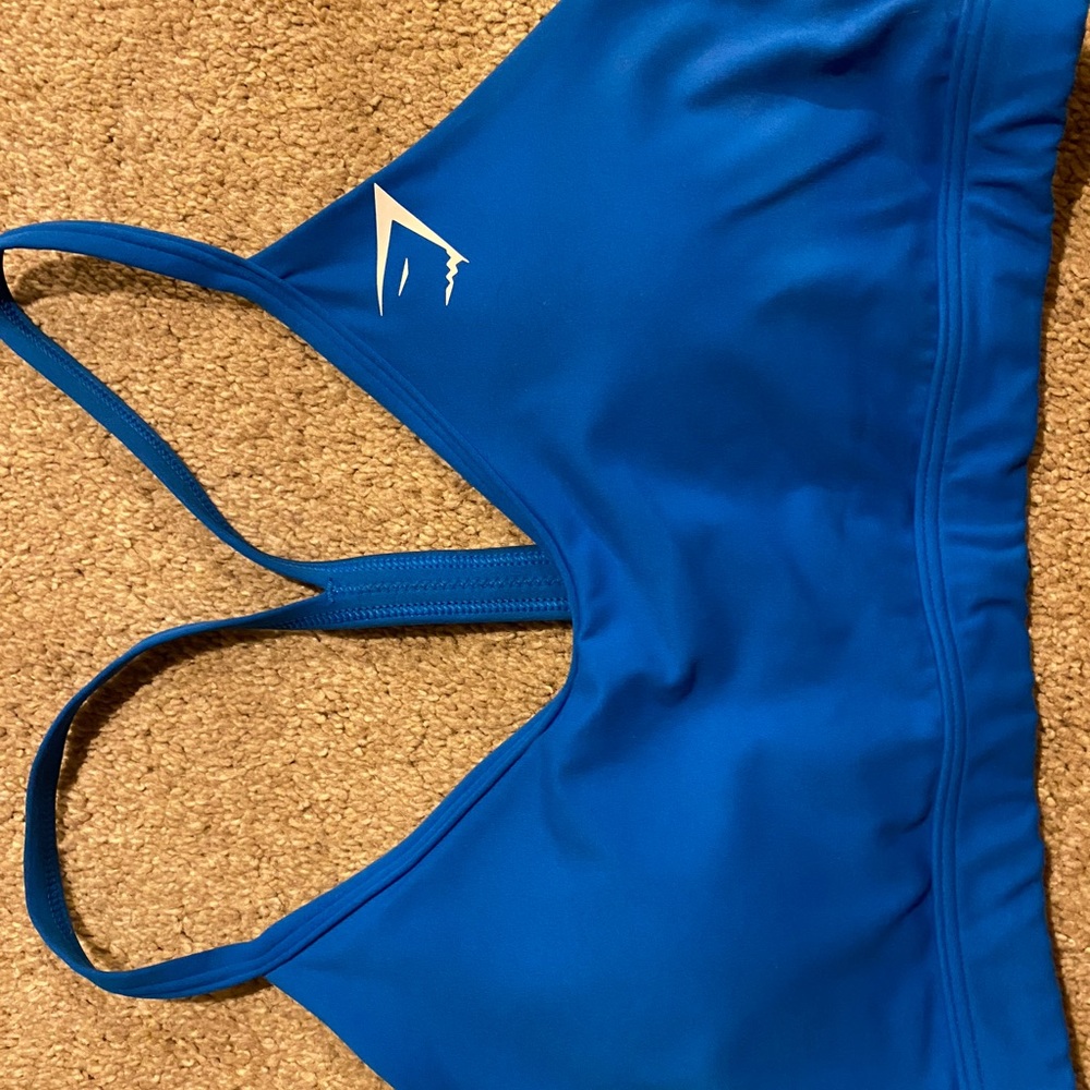 Gymshark blue bra- needs owner bigger than 34AA as it makes me look flat😭